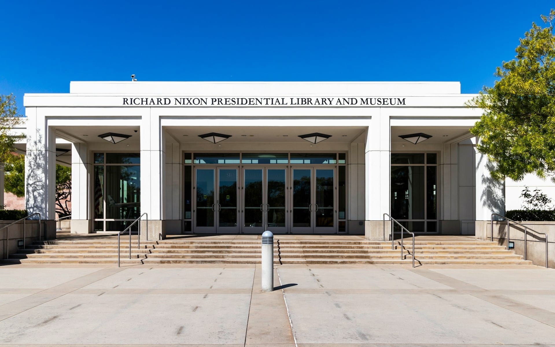 a large white building with steps leading up to it